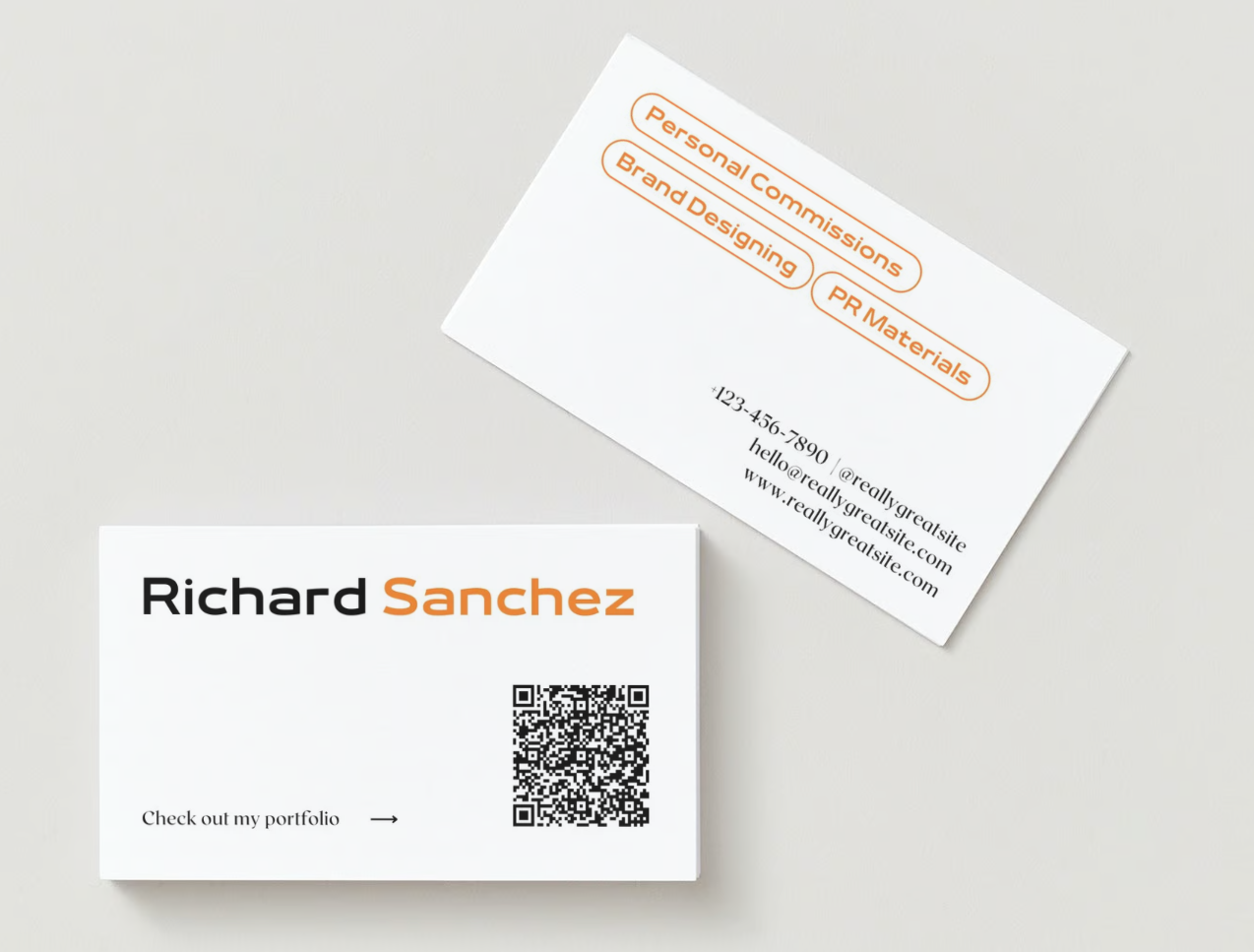 A business card with a QR code on it